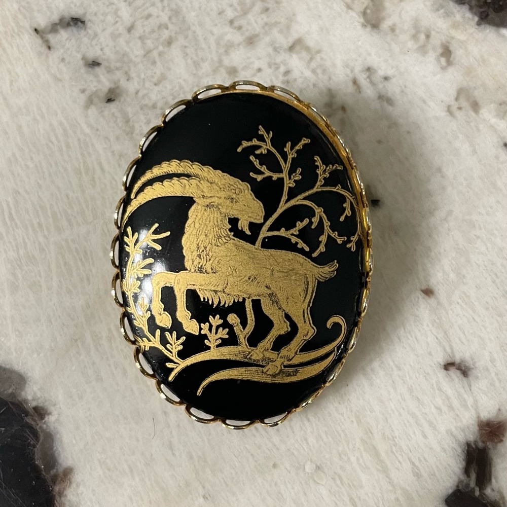 Vintage Black and Gold Glass Cabochon Capricorn Ram Brooch